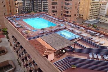 Отель Las Palmeras Affiliated by Fergus