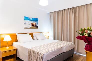 Апартаменты Helios Bay Hotel And Suites