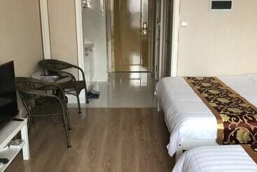 Dalian Xuanya Apartment