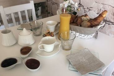 ペンション Au Charmant Des Vignes