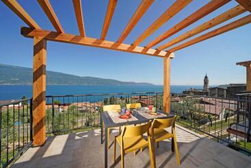 簡易ホテル Residence Dany Appartamenti Con Cucina Vista Lago Piscina E Parcheggio