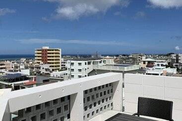 דירות לתיירים Yomitan Condhotel Nd