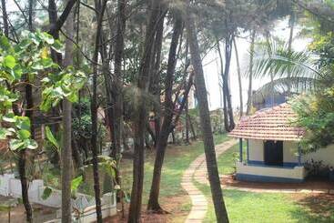 호텔 Dhuni Resorts Goa