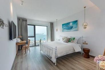 Floral Hotel · Jing Hai Man Ju Qingdao