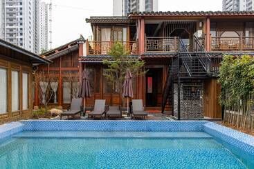 بنسيون Qiansu Ban Jiang Xia Boutique Inn