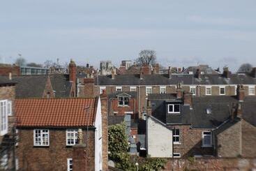 דירות לתיירים Mcmillan House Studio Apartments