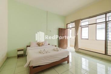Отель Pondok Cahaya Panorama Mitra Reddoorz