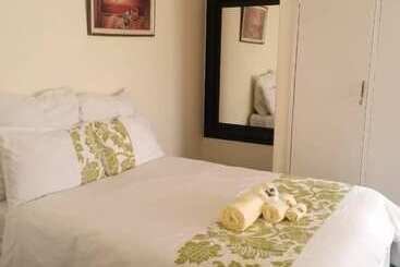 بنسيون Ingwe Place Guest House