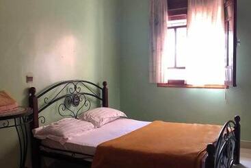 Nomad Surf House   Hostel