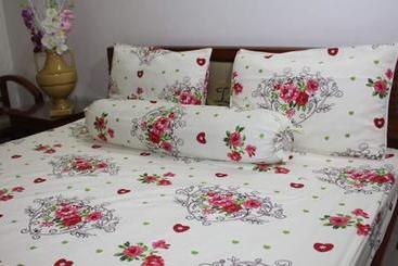 تختخواب و صبحانه Nhà Nghỉ Xuân Lan Cần Thơ