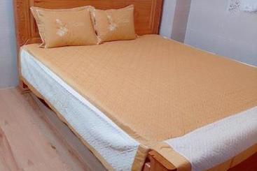 تختخواب و صبحانه Nhà Nghỉ Xuân Lan Cần Thơ