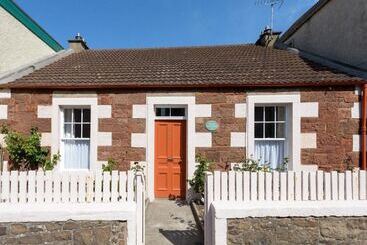 ツーリストアパートメント Beresford Cottage