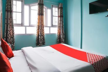 Отель Capital O  Sobo Central