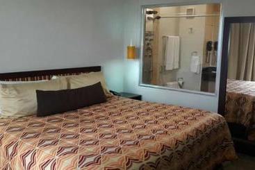 Отель Coronado Suites