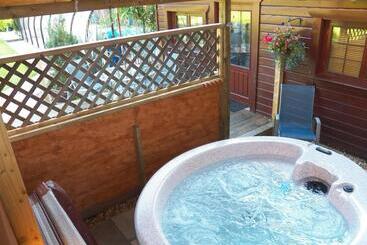 ペンション Cypress Log Cabins Accommodation