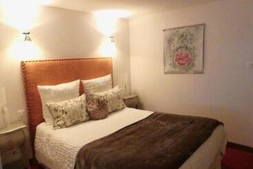 Отель Le Chapeau Rouge