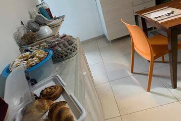 تختخواب و صبحانه Harmony Rooms