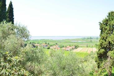 Сельский дом House Overlooking The Lake, In A Hilly Position
