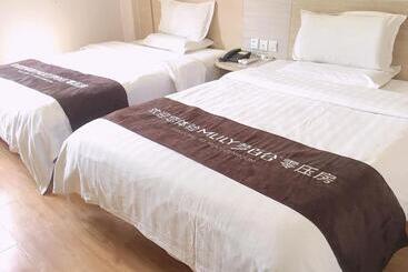 בית מלון כפרי 7days Inn Huaibei Zhongtai Plaza Wanda Studios