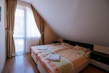 בית מלון כפרי Red Iguana