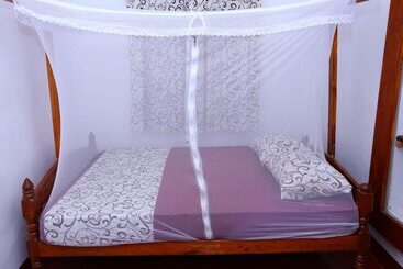 Отель Mala's Home Stay