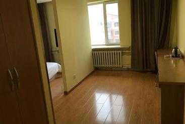 Отель 7days Inn Hegang Jin Guang Building