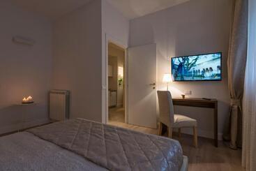 تختخواب و صبحانه Aruna Suites