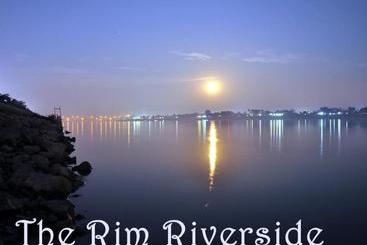 Отель The Rim Riverside Guest House