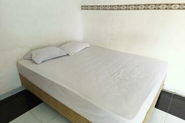 Пансион Bumi Merpati Residence Makassar Mitra Reddoorz