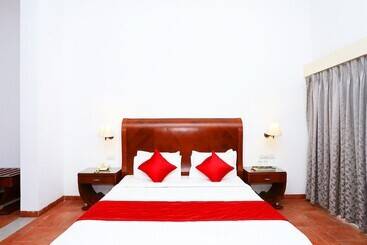 ホテル Capital O 29855 Island Inn