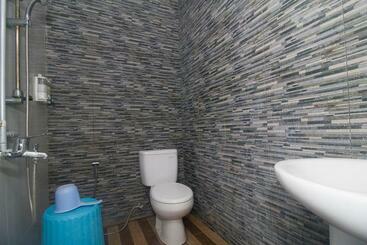 ペンション Reddoorz Plus Syariah Near Alun Alun Sampang