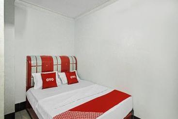 Отель Oyo 90032 Worship Usu