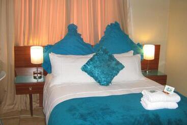 تختخواب و صبحانه Obrigado Guest House