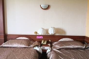 فندق Cl Garden Inn