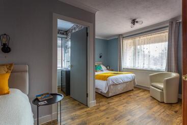 여관 Braeburn Guesthouse