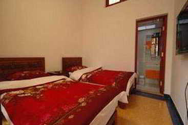 هتل Tiananmen Best Year Courtyard