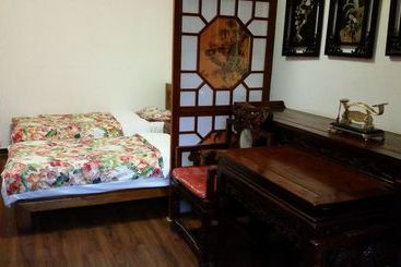 هتل Tiananmen Best Year Courtyard