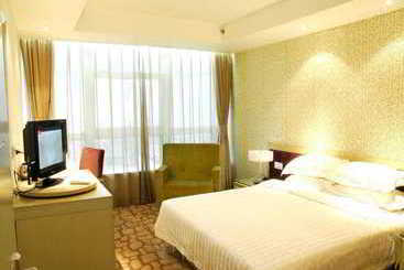 Ailihua Qingdao Hotel & Serviced Apartment