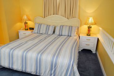 هتل Resortquest Rentals At Crystal Sands East & West