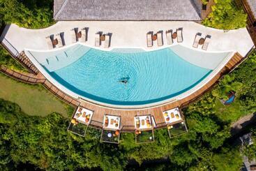 בית מלון כפרי Six Senses Yao Noi