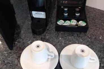 호스텔 Beachcliff Rooms & Apartments