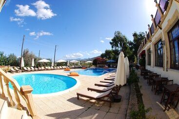 Отель Bellapais Monastery Village