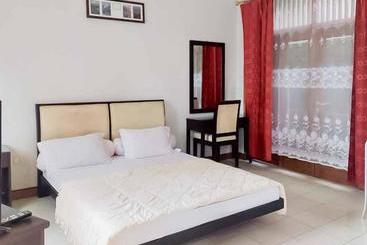 בית מלון כפרי Rumah Pahoman Syariah Mitra Reddoorz