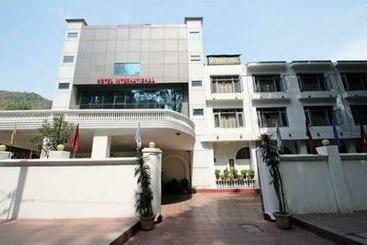 Отель International