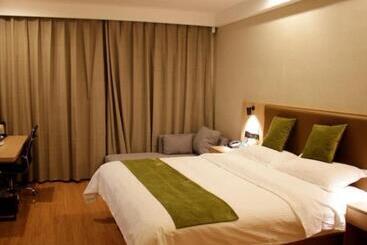 Отель Greentree Inn Heze Cao County Railway Station Business