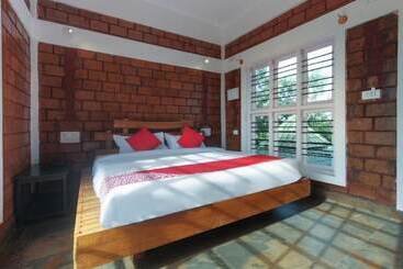 בית מלון כפרי Coorg Gateway Resort