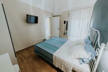 تختخواب و صبحانه La Casa Di Achille