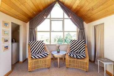 پانسیون Riverside Retreat