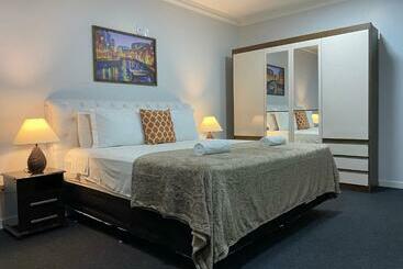 Отель Quarto Luxo Silver