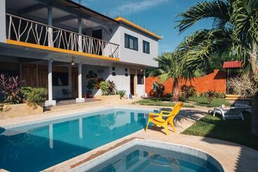 ペンション Coccoloba Guest House